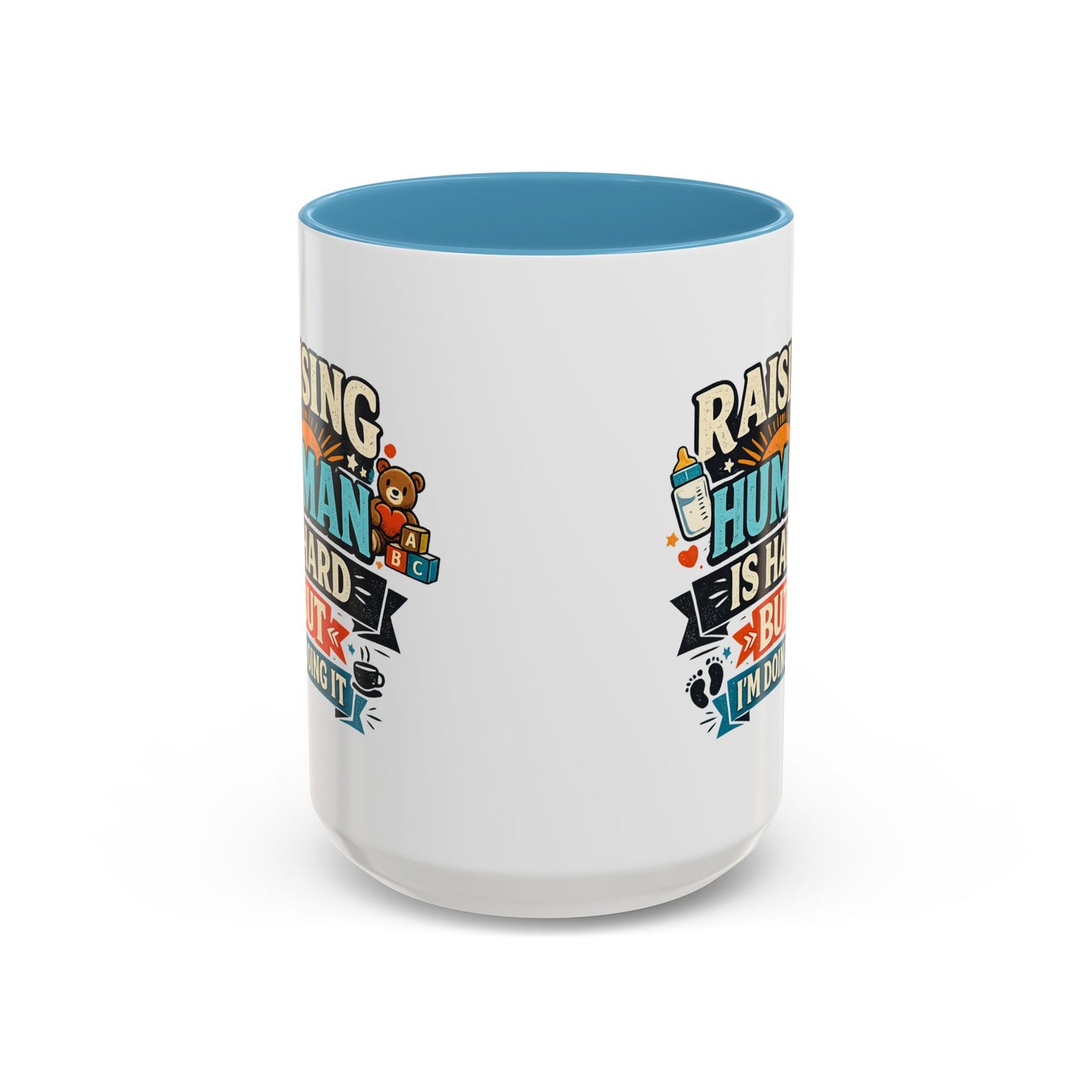 Accent Coffee Mug — "Raising Humans Is Hard But I'm Doing It"