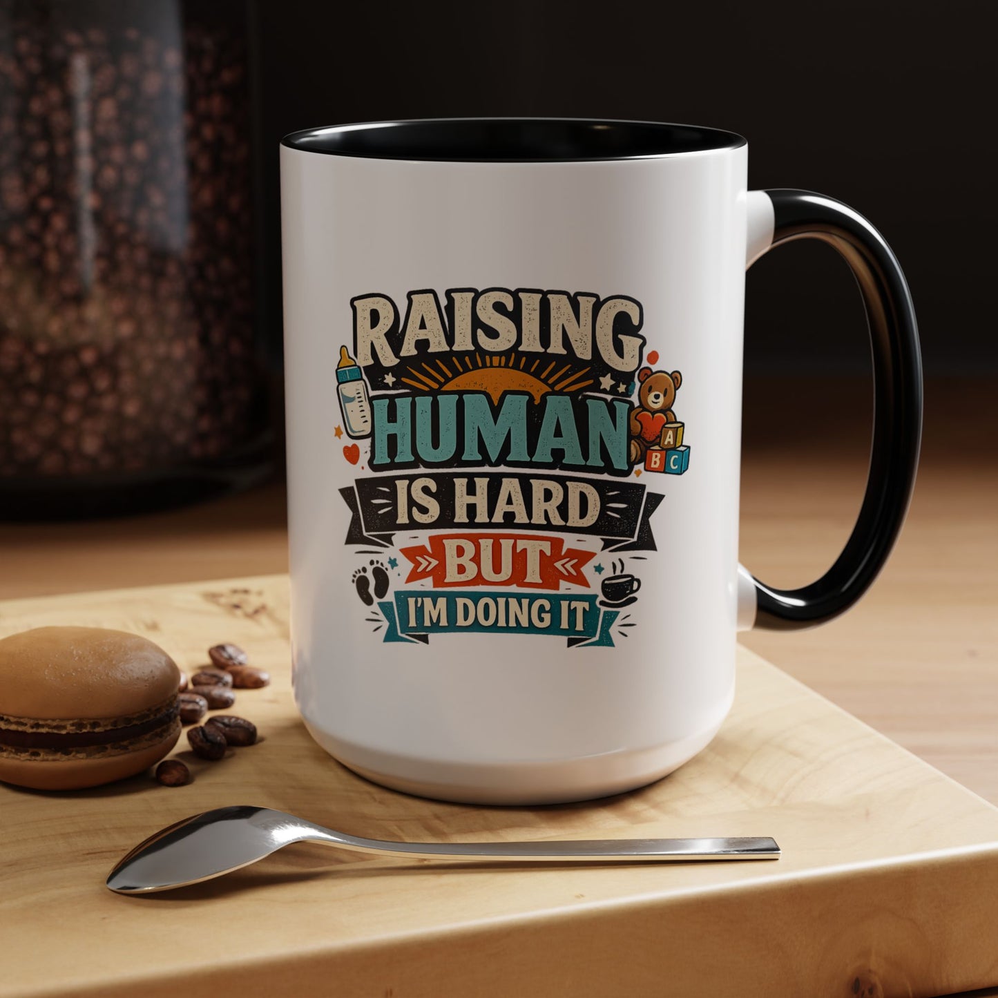 Accent Coffee Mug — "Raising Humans Is Hard But I'm Doing It"