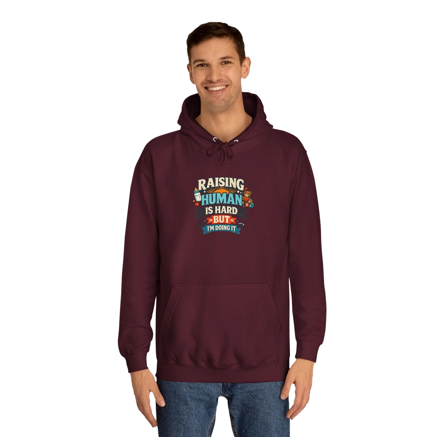 Parenthood Hoodie — “Raising Humans Is Hard But I’m Doing It” College Sweatshirt