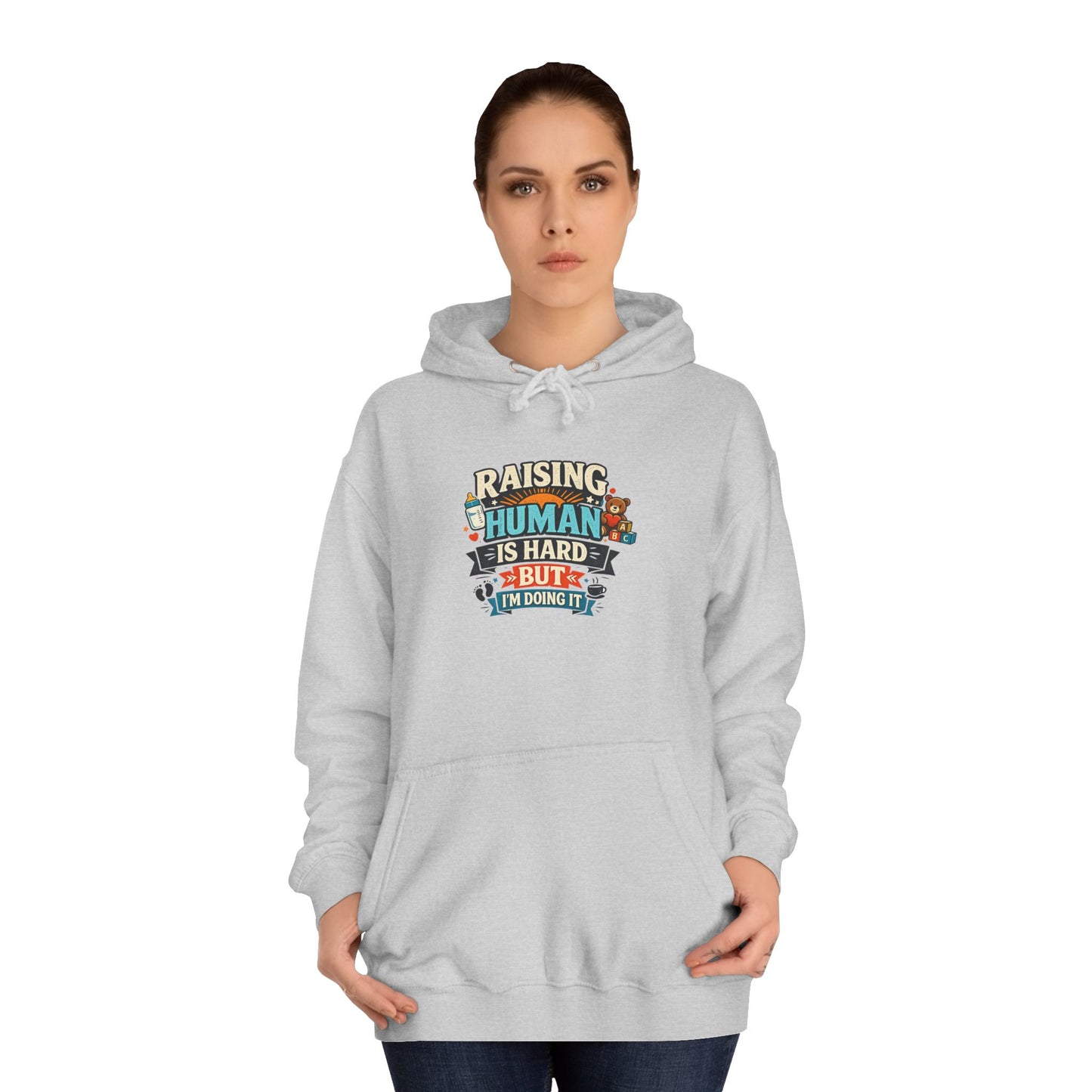 Parenthood Hoodie — “Raising Humans Is Hard But I’m Doing It” College Sweatshirt