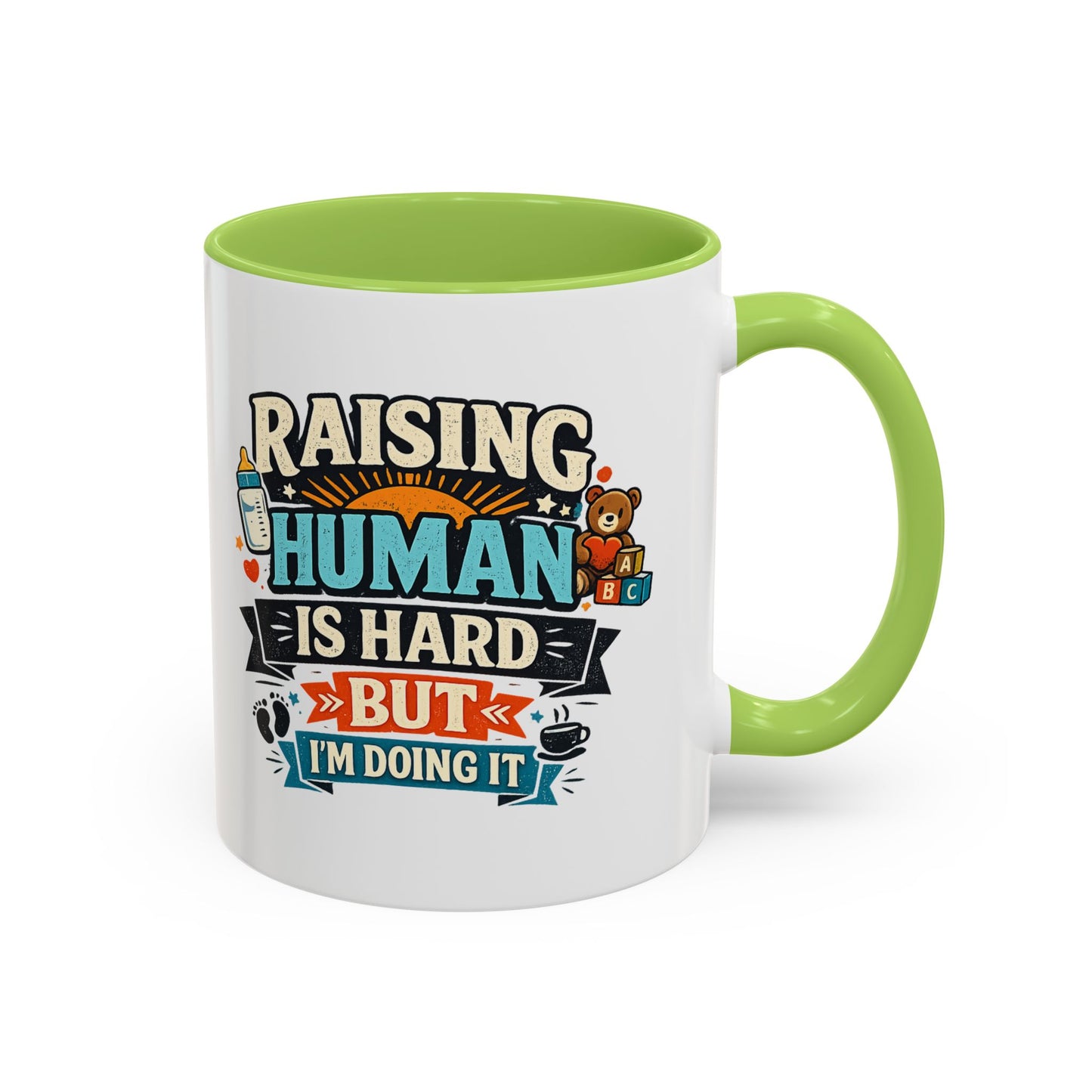 Accent Coffee Mug — "Raising Humans Is Hard But I'm Doing It"