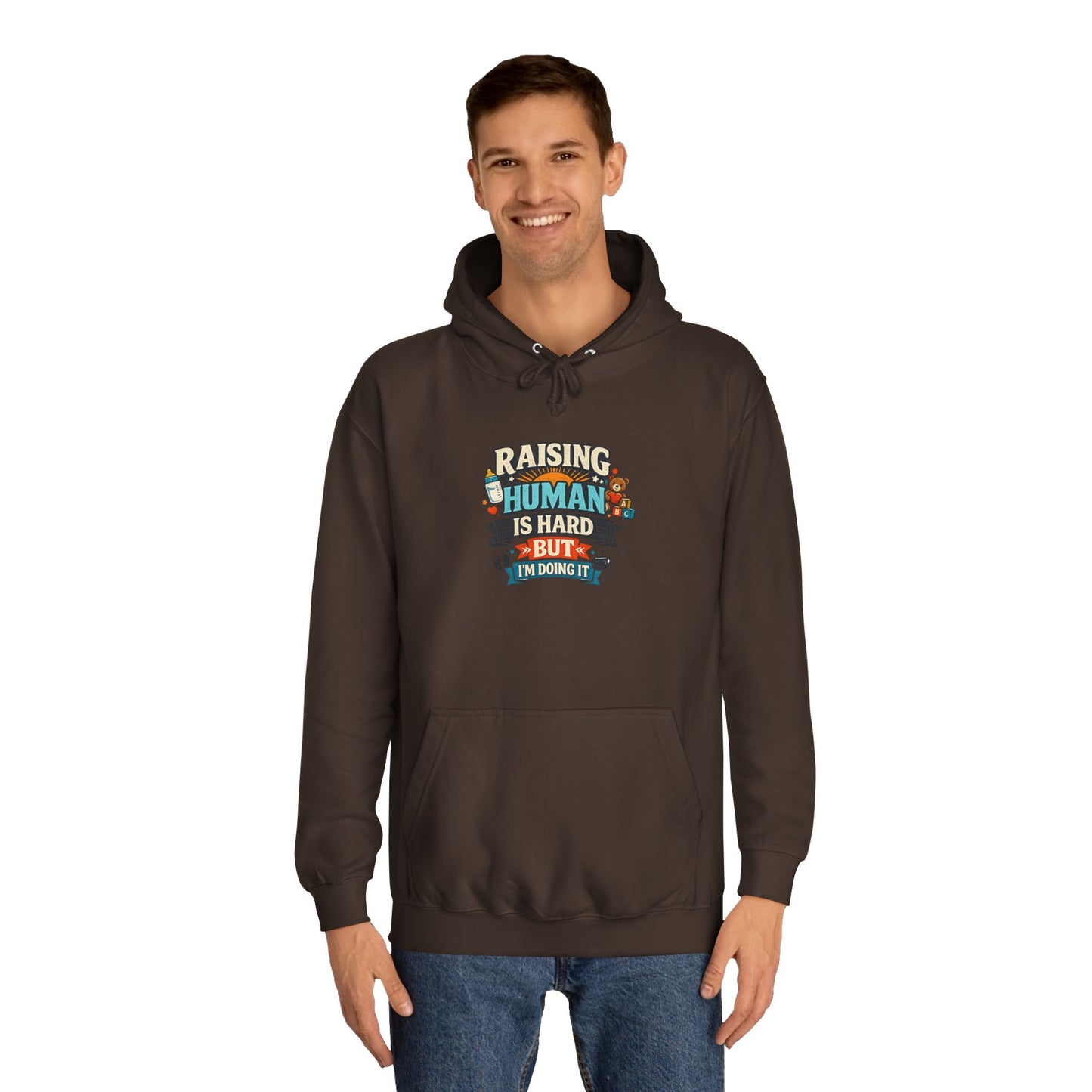 Parenthood Hoodie — “Raising Humans Is Hard But I’m Doing It” College Sweatshirt