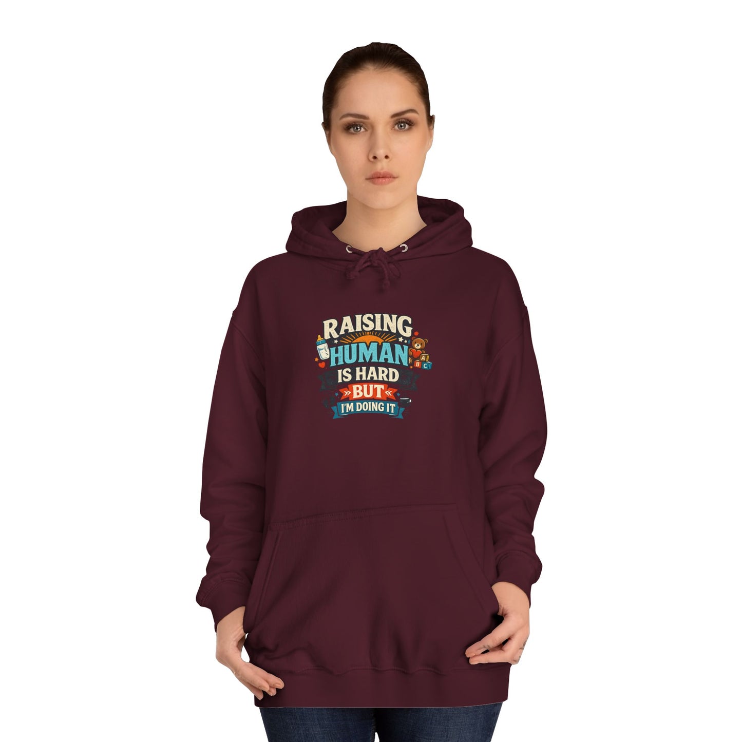 Parenthood Hoodie — “Raising Humans Is Hard But I’m Doing It” College Sweatshirt