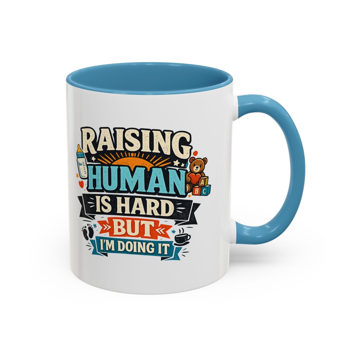 Accent Coffee Mug — "Raising Humans Is Hard But I'm Doing It"