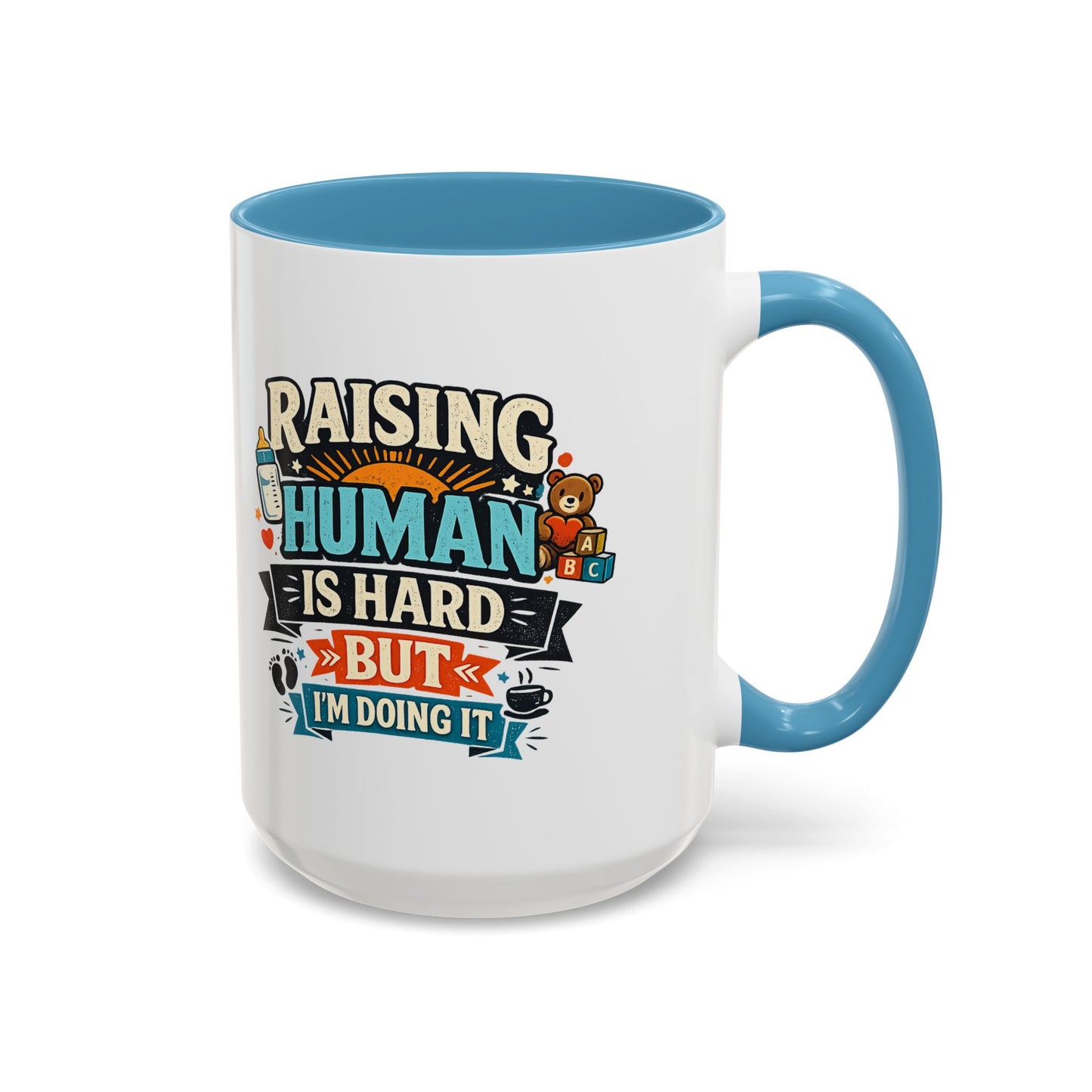 Accent Coffee Mug — "Raising Humans Is Hard But I'm Doing It"