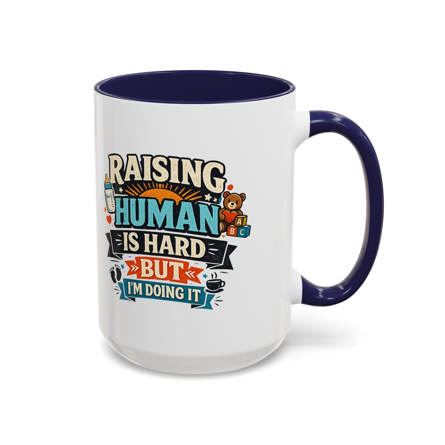 Accent Coffee Mug — "Raising Humans Is Hard But I'm Doing It"