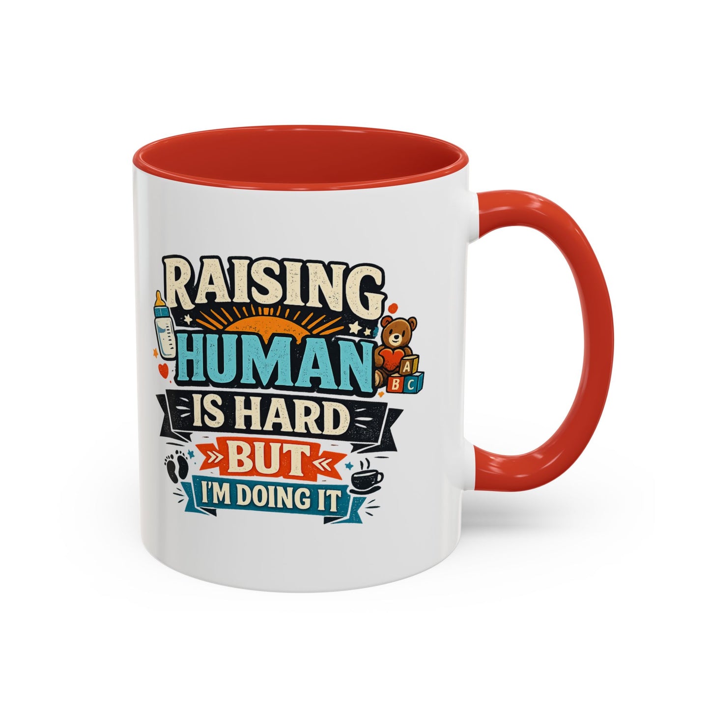 Accent Coffee Mug — "Raising Humans Is Hard But I'm Doing It"