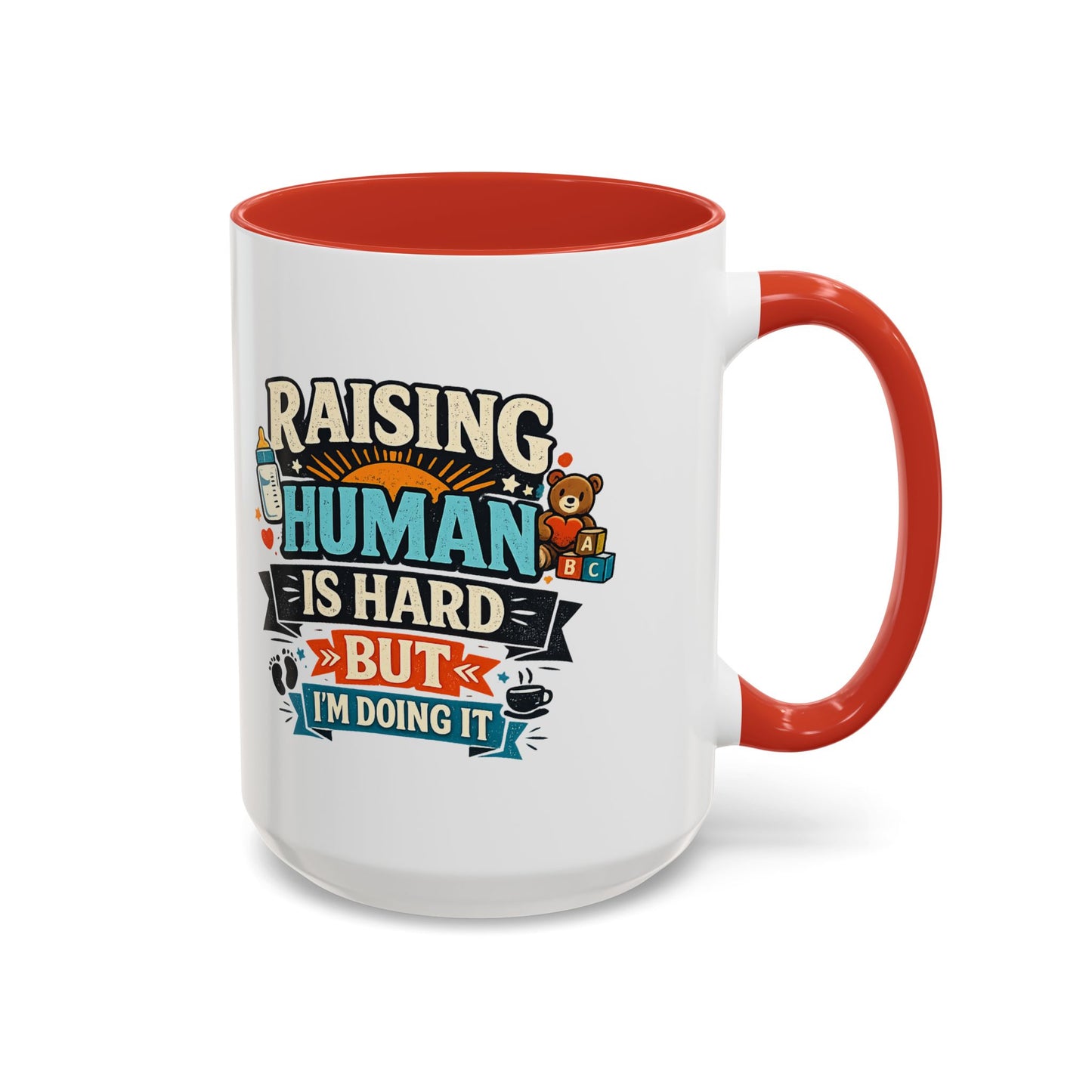 Accent Coffee Mug — "Raising Humans Is Hard But I'm Doing It"
