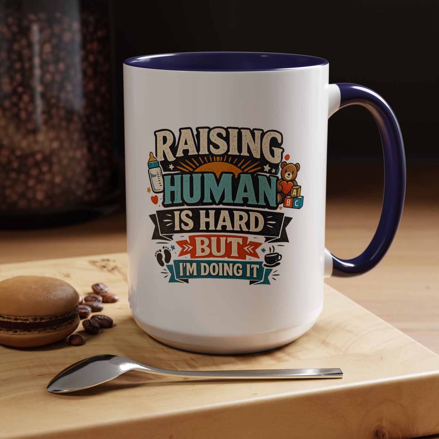 Accent Coffee Mug — "Raising Humans Is Hard But I'm Doing It"