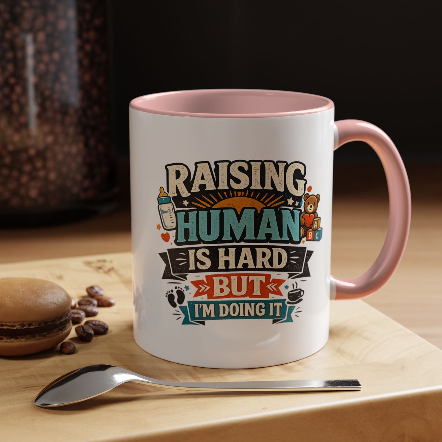 Accent Coffee Mug — "Raising Humans Is Hard But I'm Doing It"