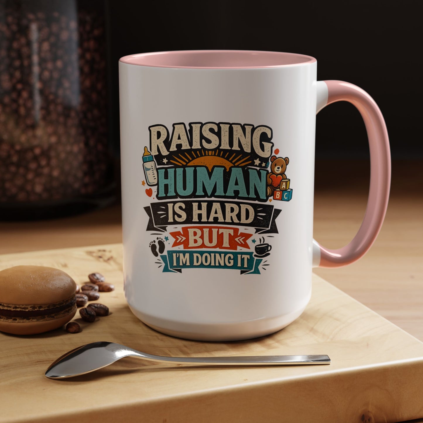 Accent Coffee Mug — "Raising Humans Is Hard But I'm Doing It"