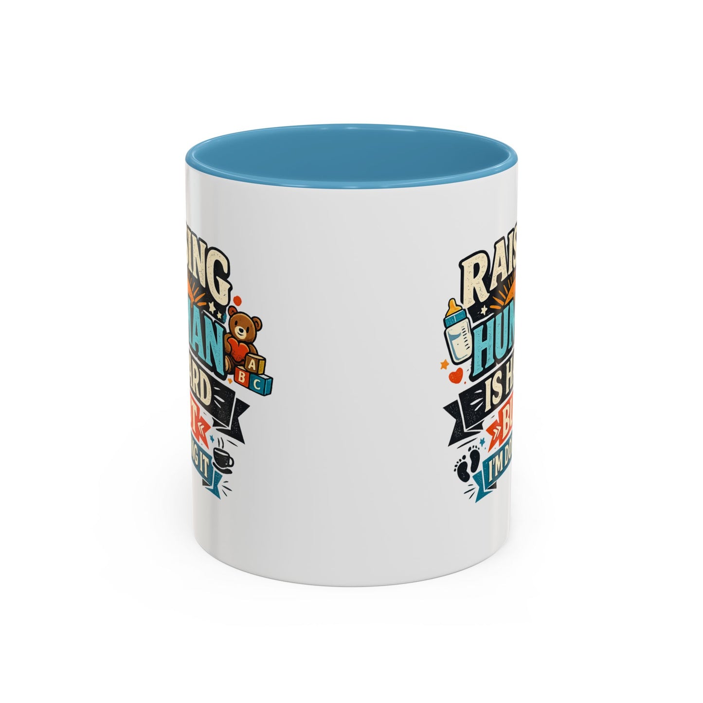 Accent Coffee Mug — "Raising Humans Is Hard But I'm Doing It"
