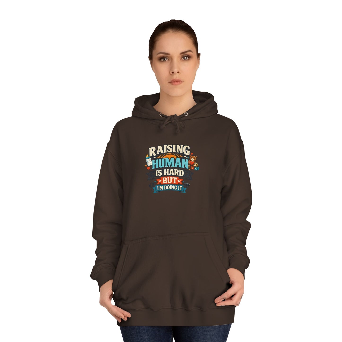 Parenthood Hoodie — “Raising Humans Is Hard But I’m Doing It” College Sweatshirt